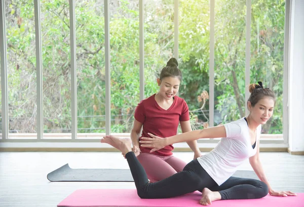 Two Beautiful Asian Women Who Exercising Doing Yoga Room Practice — Stock Photo, Image