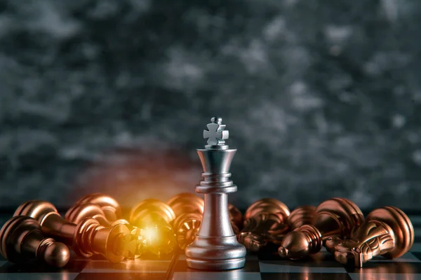 Silver chess, the winner of the competition stands in the middle of the chess, losing to play successfully in the competition Marketing planning concepts, management strategies or leadership