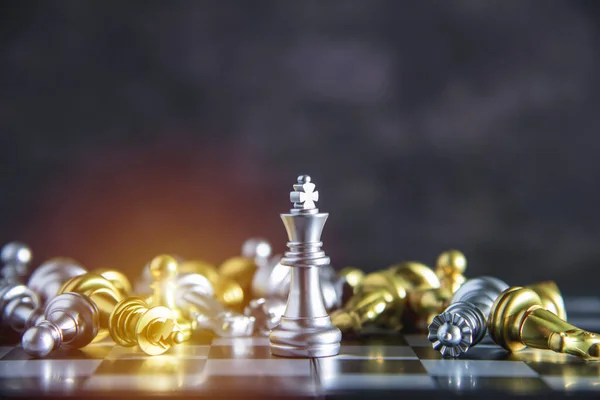 Silver chess, the winner of the competition stands in the middle of the chess, losing to play successfully in the competition Marketing planning concepts, management strategies or leadership