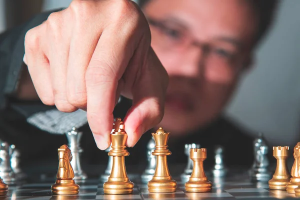 business Young  people are walking chess to play successfully in the competition Marketing planning concepts, strategy, organization management or leadership