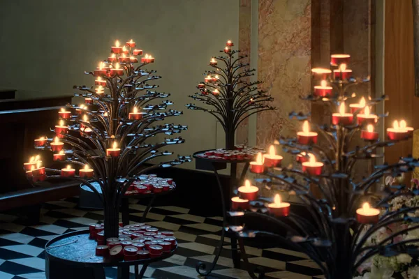 BERGAMO, LOMBARDY / ITALY - JUNE 25: Candles in the Cathedral of — стоковое фото