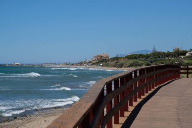 CALAHONDA, ANDALUCIA/SPAIN - JULY 2 : Boardwalk at Calahonda Cos clipart