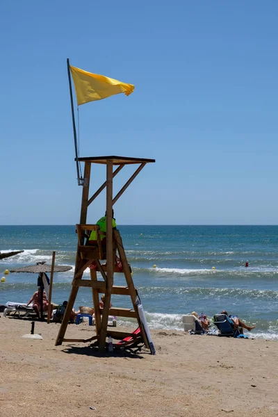 CALAHONDA, ANDALUCIA/SPAIN - JULY 2 : Lifeguard on Duty at Calah — Stock Photo, Image