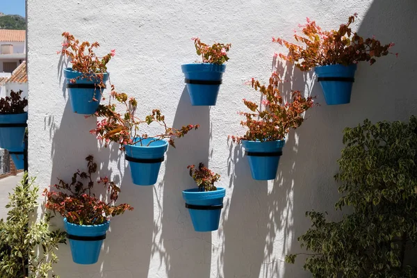 MIJAS, ANDALUCIA / SPAIN - JULY 3: Blue Flower Pots in Mijas An — стоковое фото