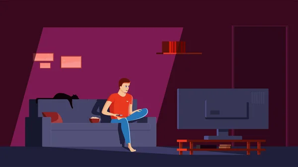 Bekar adam TV 'de gece haberlerini izliyor.