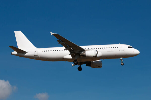 Huge twin engine plane taxi at the airport apron