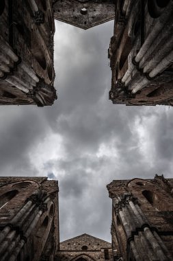 Abbey of San Galgano with collapsed roof after a lightning strike on the bell tower clipart