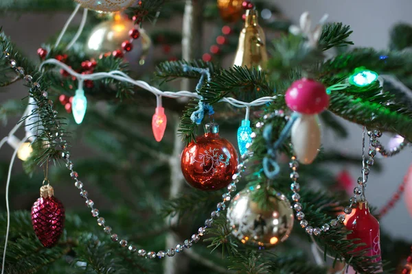 Old Soviet Christmas decorations on New Year tree. — Stock Photo, Image