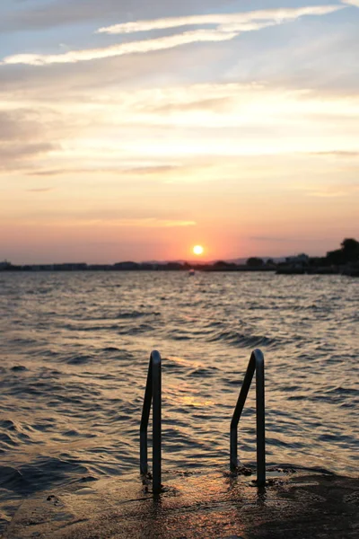 Beautiful Sunset Concrete Rocky Jetty Metal Steps Leading Sea — 스톡 사진