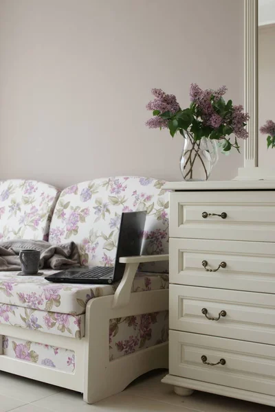 Laptop Teacup Blanket Sofa Lilac Branches Commode Background — Stock Photo, Image