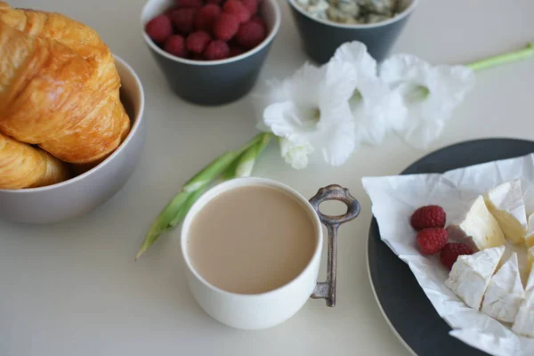 Tasty Breakfast Cappuccino Croissants Cheese Raspberries Kitchen Table — Stock Photo, Image