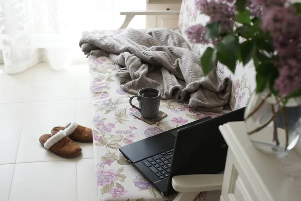 Home Work Place Sofa Laptop Teacup Lilac Branches Table Background — Stock Photo, Image