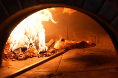 Neapolitan wood-fired pizza in  stove