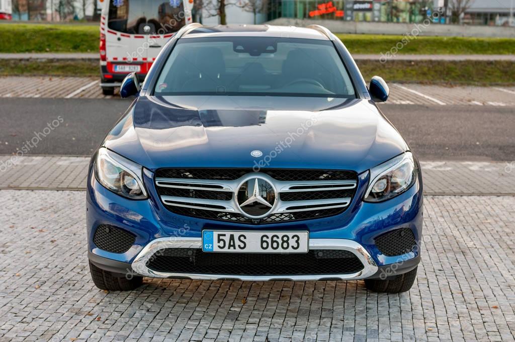 PRAGUE, THE CZECH REP., NOVEMBER 27, 2016: Closeup of front view luxury car Mercedes-Benz GLC 220d parking in front of car store Daimler.