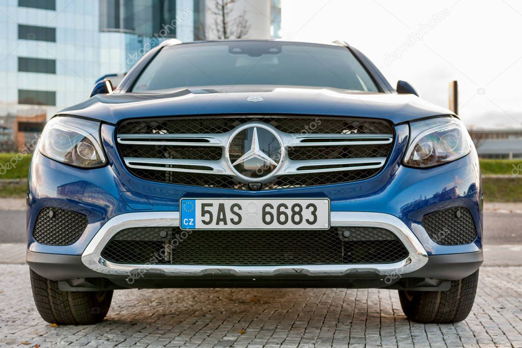 PRAGUE, THE CZECH REP., NOVEMBER 27, 2016: Closeup of front view luxury car Mercedes-Benz GLC 220d parking in front of car store Daimler.