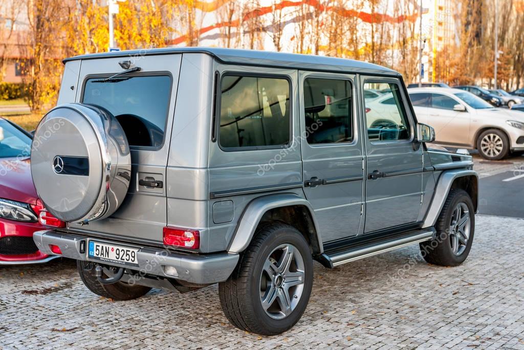 PRAGUE, THE CZECH REP., NOVEMBER 27, 2016: Closeup of new luxury car Mercedes-Benz G 350 d parking in front of car store. Detail of rear view of car