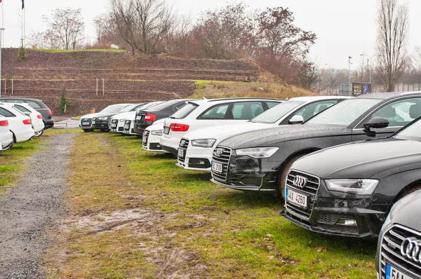 Luxury cars parked in front of car dealer — Stock Photo, Image