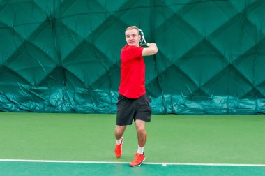 profesyonel tenis oyuncusu. 