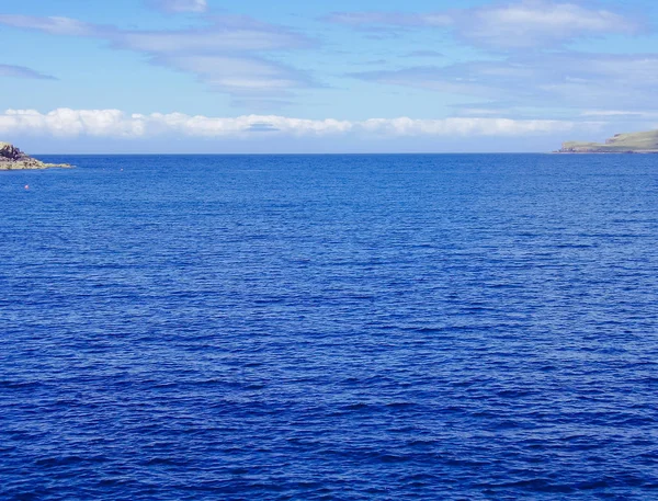 Paisaje oceánico azul con sol arriba —  Fotos de Stock