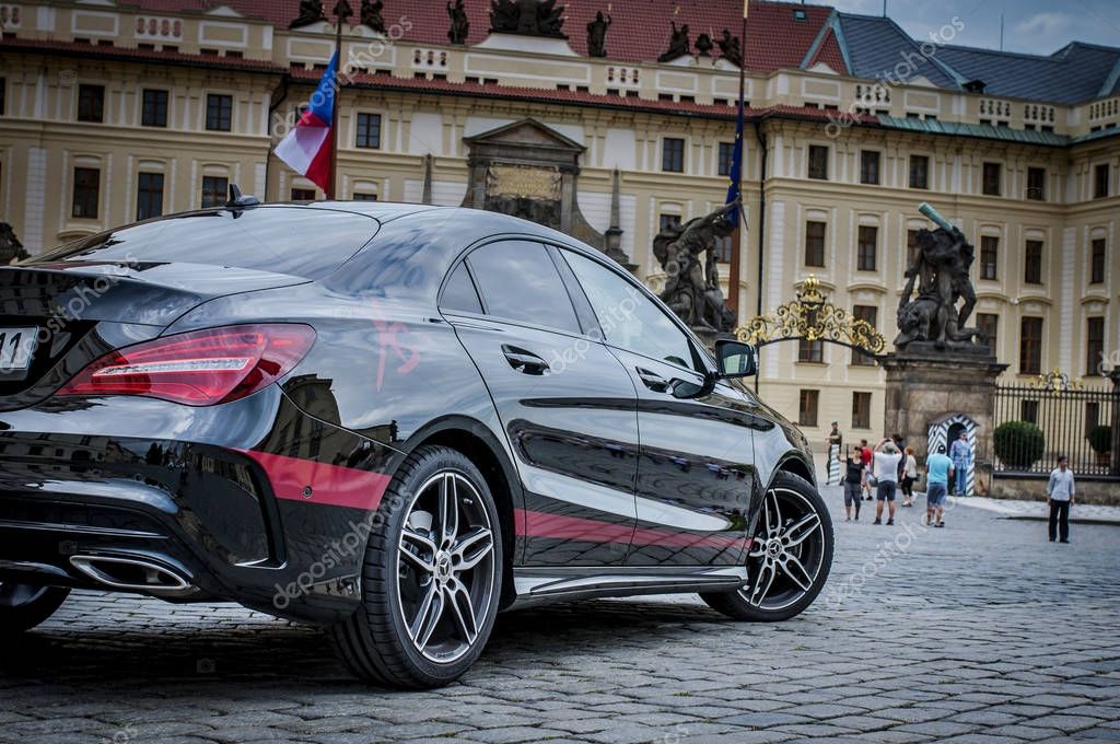 PRAGUE,THE CZECH REPUBLIC, 31.8.2017: Closeup of Mercedes Benz CLA 45 AMG, black car with red sports strips. Rare view of car