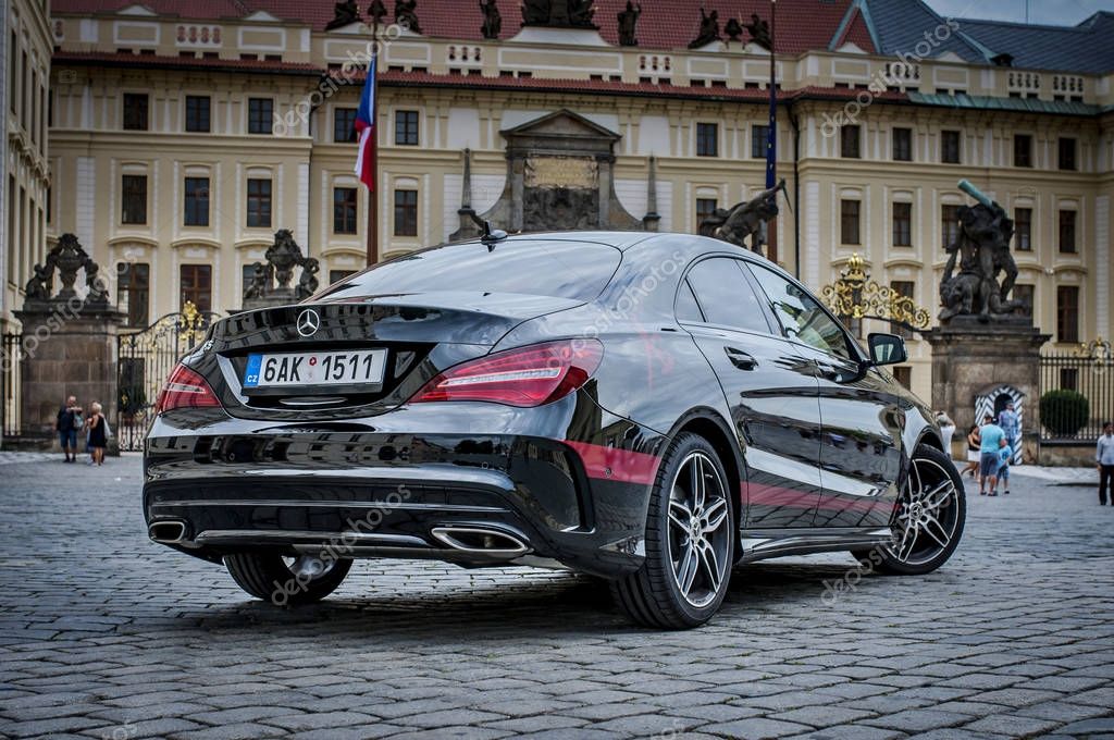 PRAGUE,THE CZECH REPUBLIC, 31.8.2017: Closeup of Mercedes Benz CLA 45 AMG, black car with red sports strips. Rare view of car