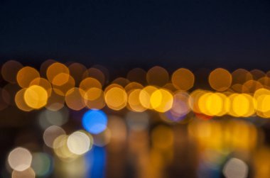Bokeh arka planda gece şehir. Bulanık renkli arka plan ile gece bokeh.