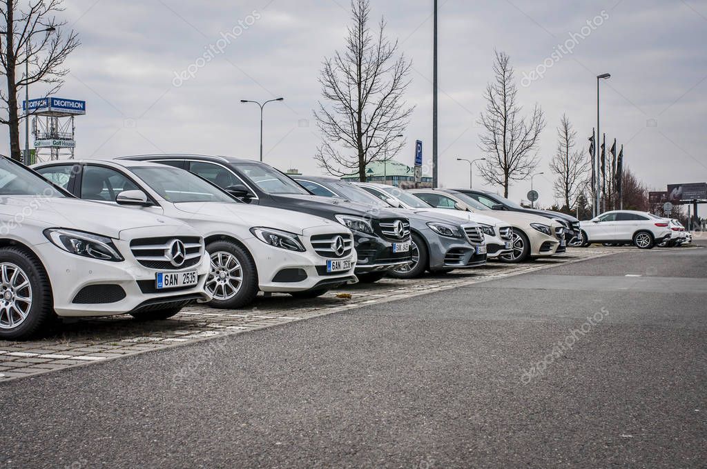 PRAGUE, THE CZECH REPUBLIC, 24.3.2018 - New luxury cars Mercedes Benz parking in front of Car store Mercedes, Prague. Luxury new cars parking in row.