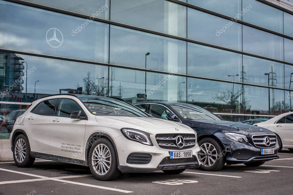 PRAGUE, THE CZECH REPUBLIC, 24.3.2018 - New luxury cars Mercedes Benz parking in front of Car store Mercedes, Prague. Luxury new cars parking in row.