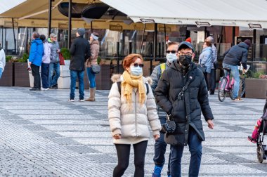 Prague, The Czech Republic, 14.3.2020: Asian tuorist with face masks. New type coronavirus 2019-nCoV pneumonia in Prague.