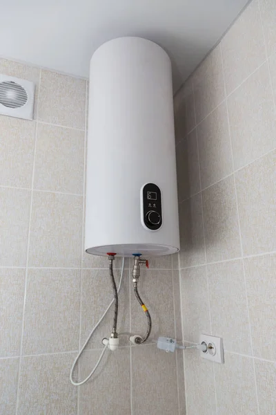 Electric water heater. In the bathroom.