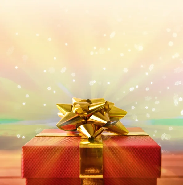 Red gift box macro with glitter and colorful front view — Stock Photo, Image