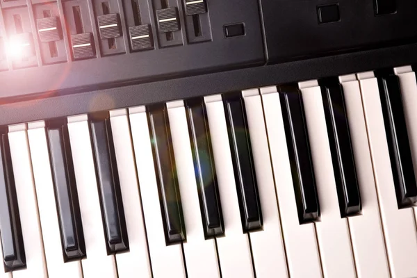 Synthesizer keyboard with shine top view — Stock Photo, Image
