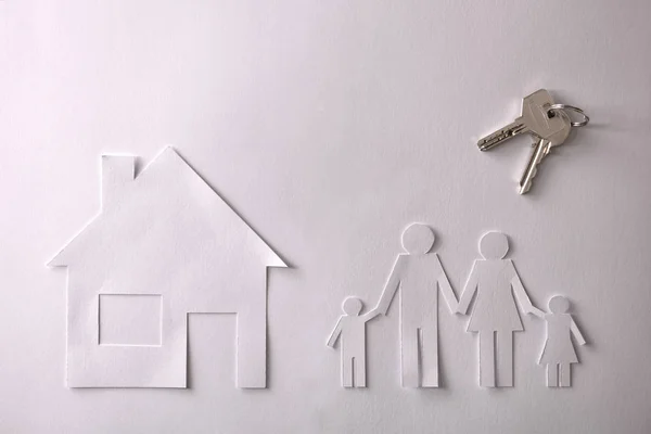 Concept of house and family in paper with keys top — Stock Photo, Image