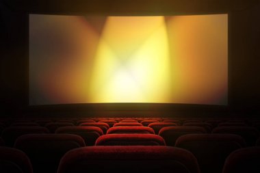 Sıra kırmızı koltuklar ve projeksiyon perdesi ile arka planda Altın ışık ile sinema salonu