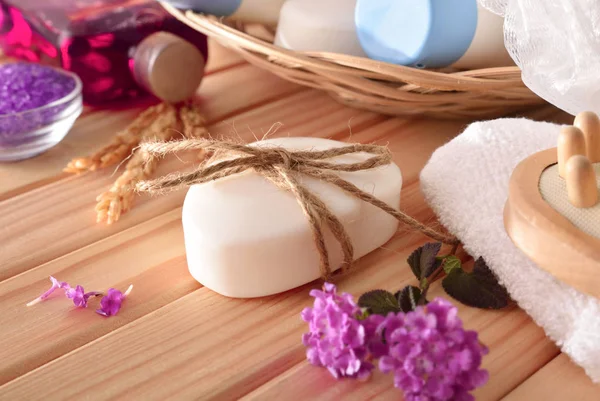 Massage and bath products on wooden table elevated — Stock Photo, Image