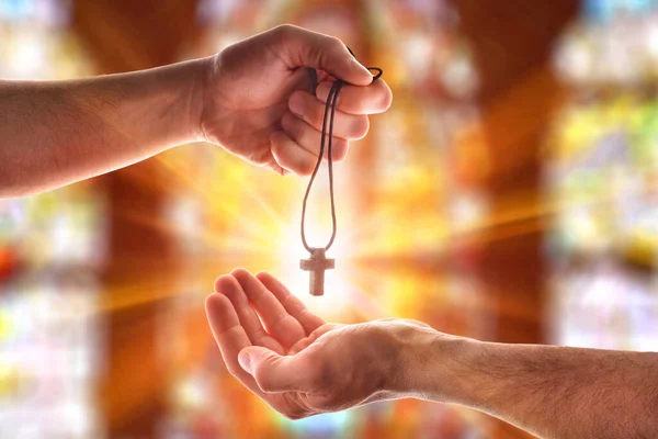 Hand Giving Another Hand Pendant Cross Symbol Church Flash Horizontal — Stock Photo, Image