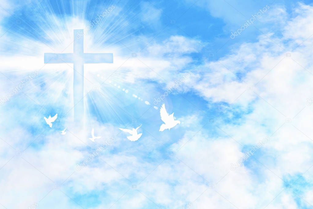 Blue sky with clouds and cross with glare and doves flying. Horizontal composition