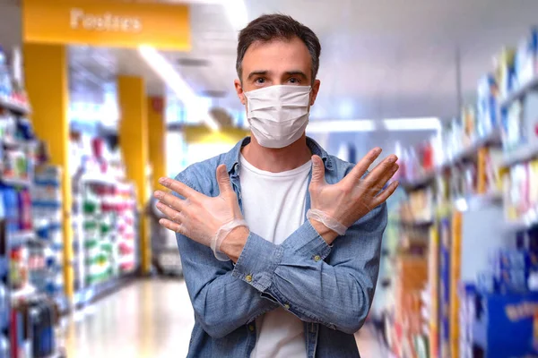 Man Showing Personal Protection Gloves Mask Aisle Store Shelves Full — Stock Photo, Image