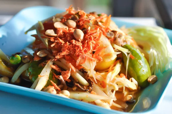 som tam, baharatlı salata veya Tayland yemeği veya Tayland baharatlı salatası.