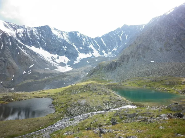 Altai waterfalls. Altai landscapes, mountain and tree views