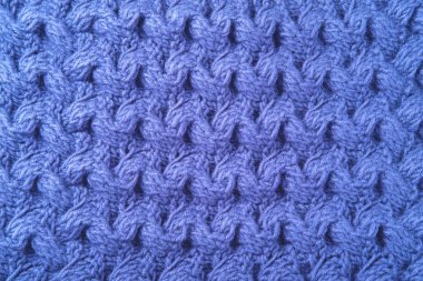 Yün örülmüş arka plan mavi renkte.