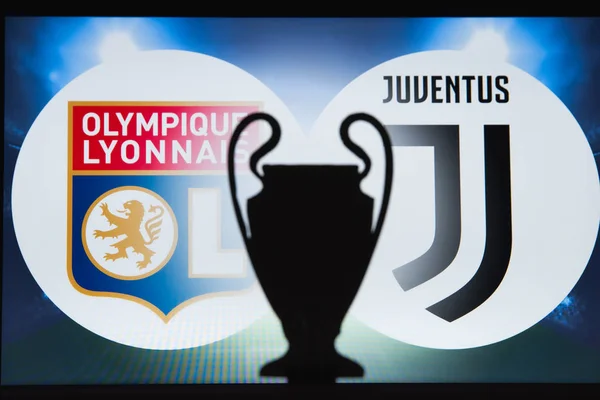 LYON, FRANCE, DECEMBER. 16. 2019: Olympique Lyon (FRA) vs Juventus (ITA). UEFA Champions League 2020, Round of 16 UCL football, Knockout stage, playoff, UCL trophy silhouette. — Stock Photo, Image