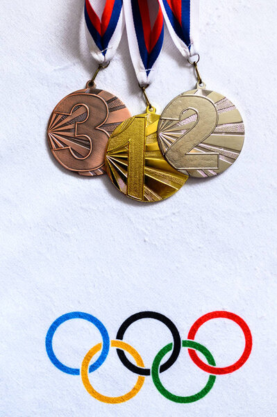 TOKYO, JAPAN, JANUARY. 20. 2020: Gold silver and bronze medal, victory concept photo, white edit space