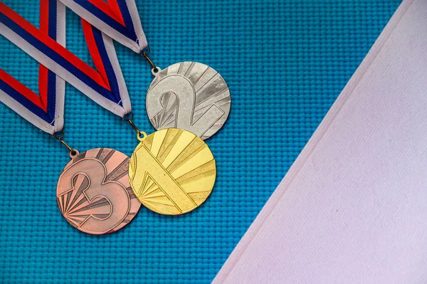 Medal ceremony concept photo. Blue background, white edit space. Original wallpaper for summer olympic game in Tokyo 2020 — Stock Photo, Image