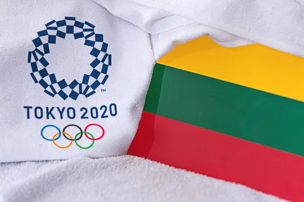 TOKYO, JAPAN, FEBRUARY. 4, 2020: Lithuania National flag, official logo of summer olympic games in Tokyo 2020. White background — Stock Photo, Image