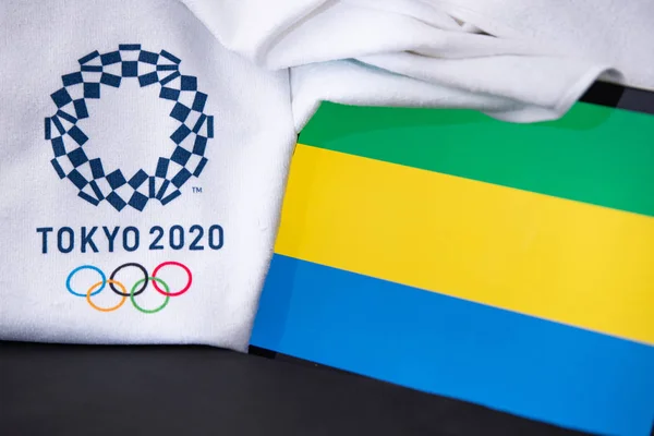 TOKYO, JAPAN, FEBRUARY. 8. 2020: Gabon at summer olympic game in Tokyo 2020, national flag, black background — Stock Photo, Image