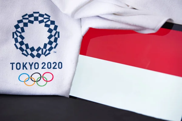 東京、日本、 2月。8 。2020年:インドネシア、東京2020オリンピック、国旗、黒の背景 — ストック写真