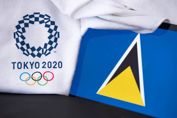 東京、日本、 2月。8 。2020年:セントルシア、東京2020オリンピック、国旗、黒の背景 — ストック写真