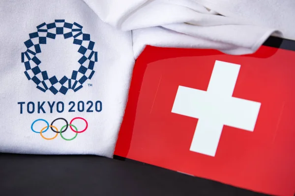 東京、日本、 2月。8 。2020年:スイス、東京2020オリンピック、国旗、黒の背景 — ストック写真