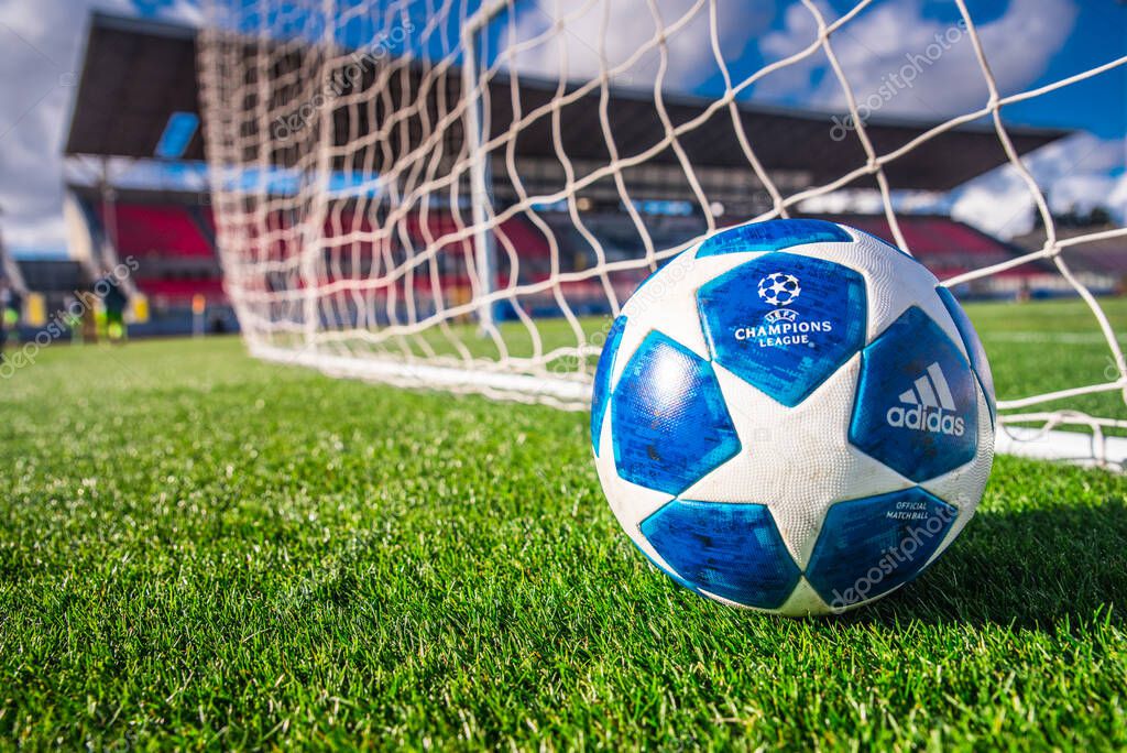 MADRID, SPAIN, JANUARY. 3. 2018: Official Champions League ball on green grass, soccer net in background